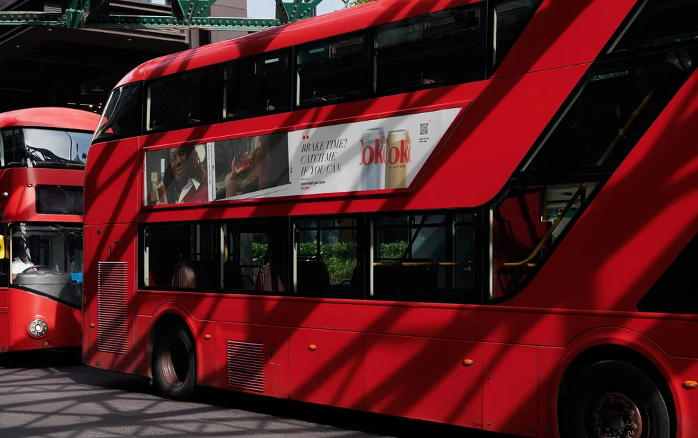 London double-decker bus carrying a Diet Coke fillet advertisement reading Brake time? Catch me if you can.