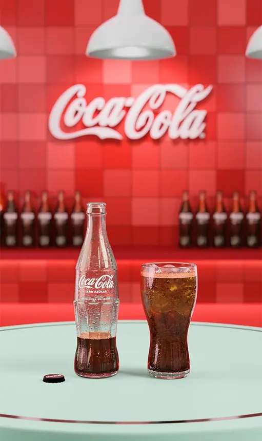 A filled bottle and a poured glass on a mint table against a red tiled wall.